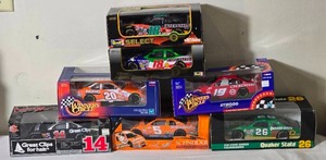 lot 160 image: NASCAR Die Cast Model Cars  124  Racing Champions  Revell  Winners Circle  Quaker State #26 Kinser (1995), Schneider #5 Trickle (2000), Great Clips #14 Elder, Home Depot #20 Stewart (1999), Dodge #19 Atwood (2000), #18 Labonte