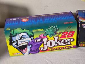 lot 159 image: NASCAR Die Cast Model Cars - 124 - Action  Racing Champions  Revell - The Joker Ford Taurus #28 Kenny Irwin (1998)  Bruce Lee Ford Taurus #99 Jeff Burton (1998)  Cartoon Network Ford Taurus #9 Lake Speed (1998)