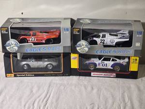 lot 144 image: Die Cast Model Cars - 118 - Maisto  Eagles Race  Anson - Porsche 917K Le Mans (1971)  (1970)  Porsche 550 A Spyder  Porsche 911 GT2 Daytona