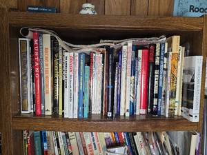 lot 566 image: Large Automotive Racing Book Collection  NASCAR, IndyCar, F1, Classic Cars, Motorsports History, Biographies, Technical Guides & More (100 Books & Manuals)