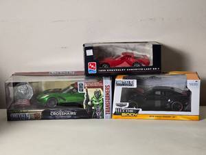 lot 142 image: Die Cast Model Cars - 124 - Metals Die Cast  ERTL - Corvette Last ZR-1 (1995)  Corvette Stingray Crosshairs (2016)  Camero SS (2016)