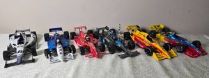 lot 105 image: IndyCar Die Cast Model Cars - 118 - Action  Maisto  Greenlight  ERTL  UT Models - Reynard #12  #1  #5  Dallara #7  #21
