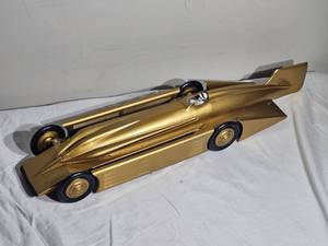 lot 77D image: Schylling Gold Metal Wind-Up Streamliner Race Car  Tin Toy Reproduction