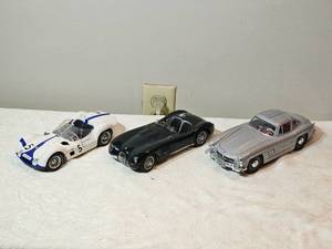 lot 68E image: 118 Die-Cast Sports Car Trio  Maserati Tipo 61 Birdcage  Jaguar C-Type  Mercedes-Benz 300SL Gullwing