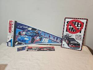 lot 202B image: Dick Trickle NASCAR Memorabilia Lot  Pennant, Metal Sign, Bumper Sticker & Collectible Pin