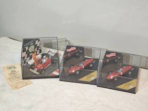 lot 202E image: Lot of 3 Ferrari 143 Die-Cast Models  Brumm Quattro Q4154 & Q4153  Vitesse Ferrari 312T (1975 Niki Lauda)  Limited Editions w Display Cases