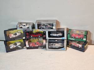 lot 203B image: 143 Scale Die-Cast Car Collection  ProgettoK, Top Model, Bang, Best, Maisto, Max Models & More (11-Piece Lot)