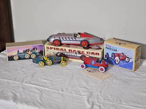 lot 204A image: Lot of 4 Vintage Schylling Tin Wind-Up Race Cars w Boxes & COAs  Spiral, Bugatti T-35, #2 Race Car, & Land Speed Style