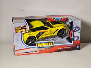 lot 567 image: New Bright RC Corvette Stingray  Rugged Ride Remote Control Car (NIB)