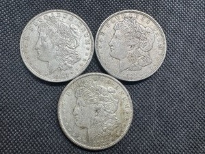 lot 76 image: Three 1921 Morgan Silver Dollars - P-D-S.