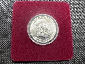 lot 87 image: 1958-D Brilliant Uncirculated Silver Franklin Half Dollar