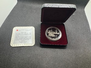 lot 66 image: 1991 Proof Canadian Commemorative Silver Dollar in Original Mint Box with COA