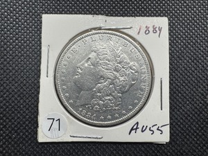 lot 71 image: 1884 Morgan Silver Dollar Marked AU55 When Purchased