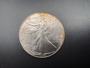 lot 26 image: Better Date 1986 Silver American Eagle First Year of Issue