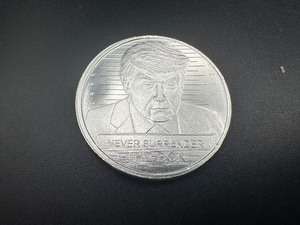 lot 38 image: BU One Ounce .999 Silver Donald J. Trump Never Surrender Round
