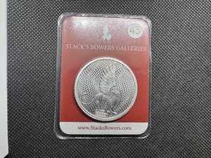 lot 43 image: 2022 BU Stacks & Bowers 1 Oz. Silver Round in Clamshell Case