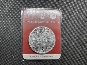 lot 44 image: 2022 BU Stacks & Bowers 1 Oz. Silver Round in Clamshell Case
