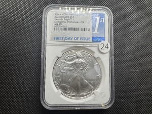 lot 24 image: 2021-S Heraldic Eagle Type 1 1 Oz. Silver American Eagle NGC MS69 First Day of Issue Emergency Production FDI