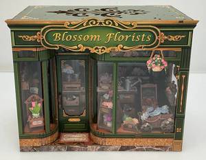 lot 59 image: Light Up Handcrafted Wood (Blossum Florists) Miniature Diarama (Works)