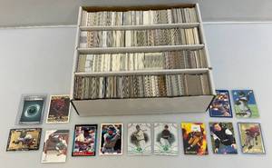 lot 125 image: Misc. Unsorted Sports Cards And More Some In Protective Sleeves