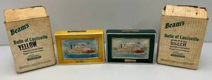 lot 168 image: Vintage Collectible Jim Beam Belle Of Louisville Yellow & Green Decanters In Original Boxes