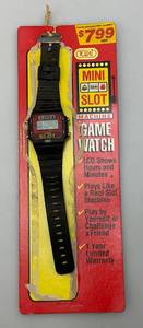 lot 196 image: Vintage Miniature Mini Slot Machine Game Watch With Original Card