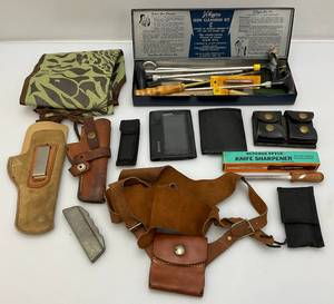 lot 203 image: Misc. Gun Related Items Including JC Higgins Gun Cleaning Kit, Leather Holsters And More