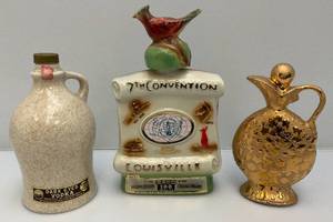 lot 223 image: Misc. Vintage Collectible Jim Beam Decanters And More