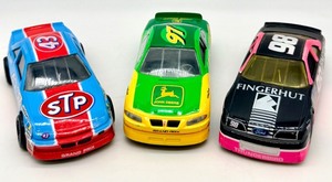 lot 70 image: Racing Champions 164 Die-Cast Lot STP 43 Grand Prix, John Deere 97, Fingerhut 98
