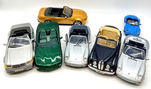 lot 75 image: Maisto 118 Diecast Car Lot  7 Cars (Mercedes, Corvette, BMW, Ford, Jaguar)