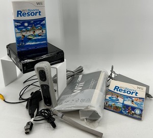 lot 4 image: Nintendo Wii Black Console Set with Wii Sports Resort Game and Controllers