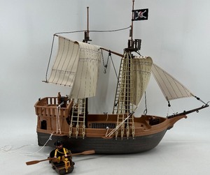 lot 9 image: Playmobil Pirate Ship with Mini Rowboat and Figure