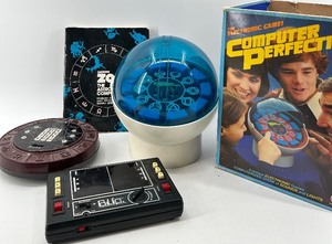 lot 18 image: Vintage Electronic Games Lot Computer Perfection, Coleco Zodiac, and Blip
