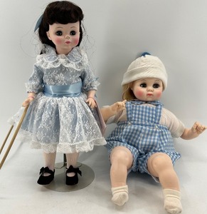 lot 22 image: Madame Alexander Dolls - Baby Brother and Girl with Outfits & Accessories