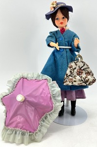 lot 91 image: Mary Poppins Collectible Doll with Outfit, Parasol, and Handbag