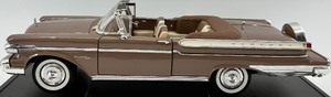 lot 121 image: 118 Diecast 1958 Mercury Turnpike Cruiser Brown Convertible Model Car