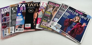 lot 141 image: Taylor Swift Eras Tour Magazine Collection with Posters and Calendar