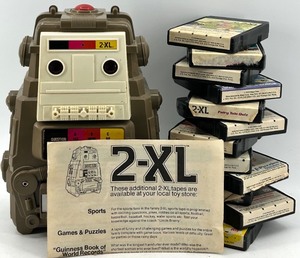 lot 47 image: 2-XL Talking Robot & 12 8-Track Tapes - MEGO Corp. 1978