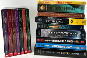 lot 58 image: Book Lot Chronicles of Narnia (7-Volume) & Riordan, Tolkien, Collins Titles