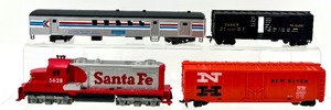 lot 223 image: Locomotive - Santa Fe 5628 & Boxcar NH 35688 & D&RGW 39497 & Amtrak 494