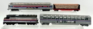 lot 233 image: Amtrak Locomotive 229, Superliner Cars & Southern Railroad Log Car - Bachmann