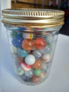 lot 2 image: Jar of Vintage Marbles