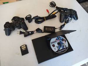 lot 35 image: PlayStation 2 With Cords, Controllers & Memory Card