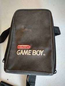 lot 53 image: Nintendo Game Boy Bag With Game Boy Advance & Pokemon Leaf Green Game