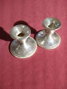 lot 89 image: (2) Sterling Silver Weighted Candlesticks