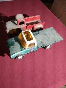 lot 106 image: (2) Vintage Nylint Metal Trucks