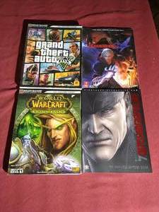 lot 116 image: (4) Video Game Guides