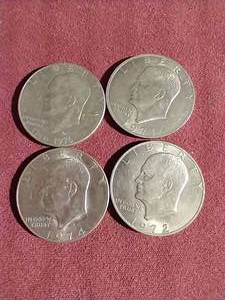 lot 147 image: (4) Eisenhower Dollars