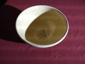 lot 240 image: Vintage Watt Pottery Bowl - Marked Edinburg Farmers Elevator 1958