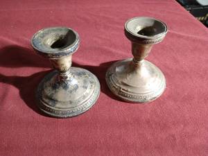 lot 264 image: (2) Sterling Steel Weighted Candlestick Holders